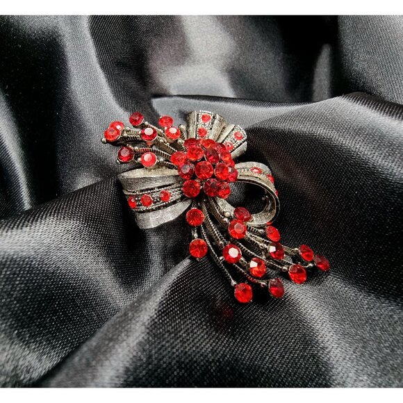 Vintage Rhinestone Bow Brooch With Red Stones & Silver-Tone Metal - Picture 1 of 4